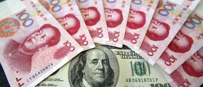 Китайский центробанк вновь понизил курс юаня