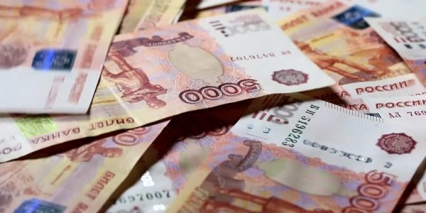 Рубль продолжит оставаться вблизи 56,5 за доллар