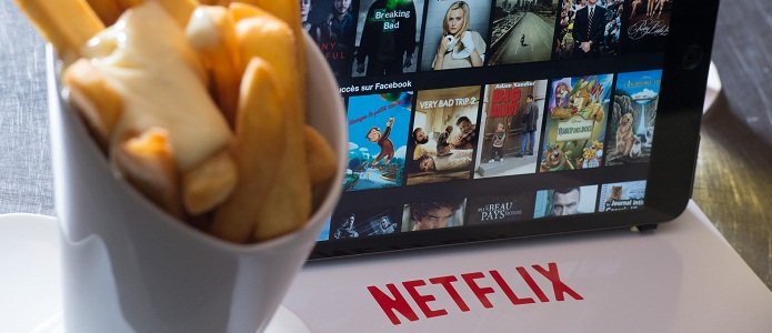 Netflix растет вширь и богатеет