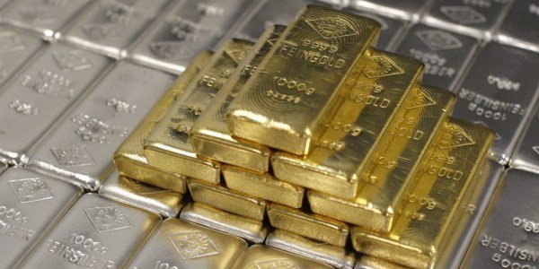 Золото и серебро подросли на слабеющем долларе